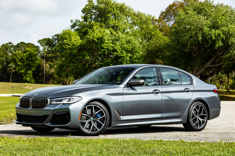 Used 2022 BMW 5 Series M550i xDrive for sale Sold at McLaren Orlando LLC in Titusville FL 32780 1