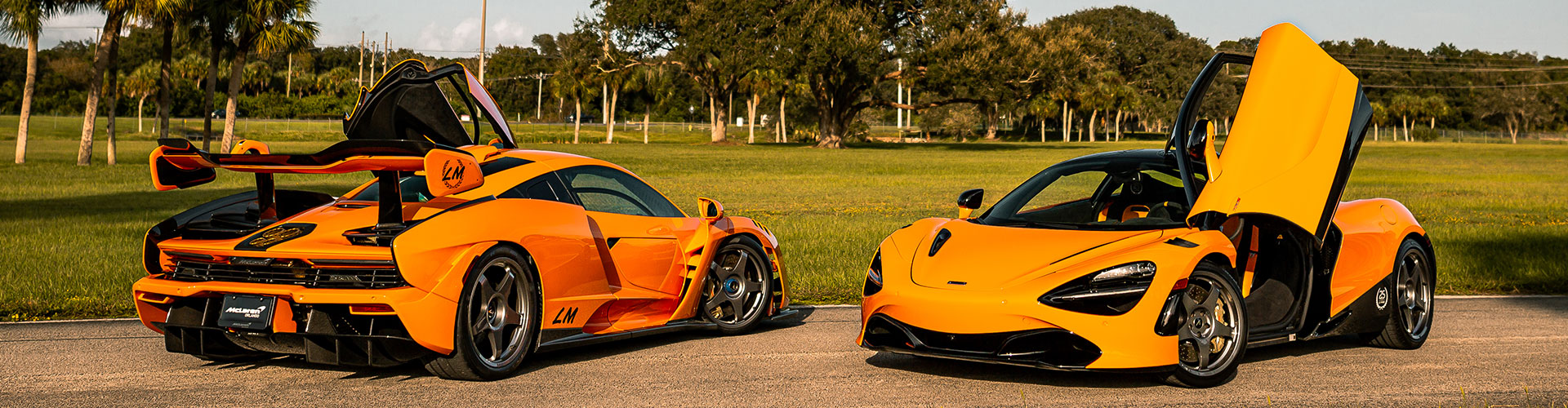 McLaren Vehicles with drivers side door open. Le Mans Victory